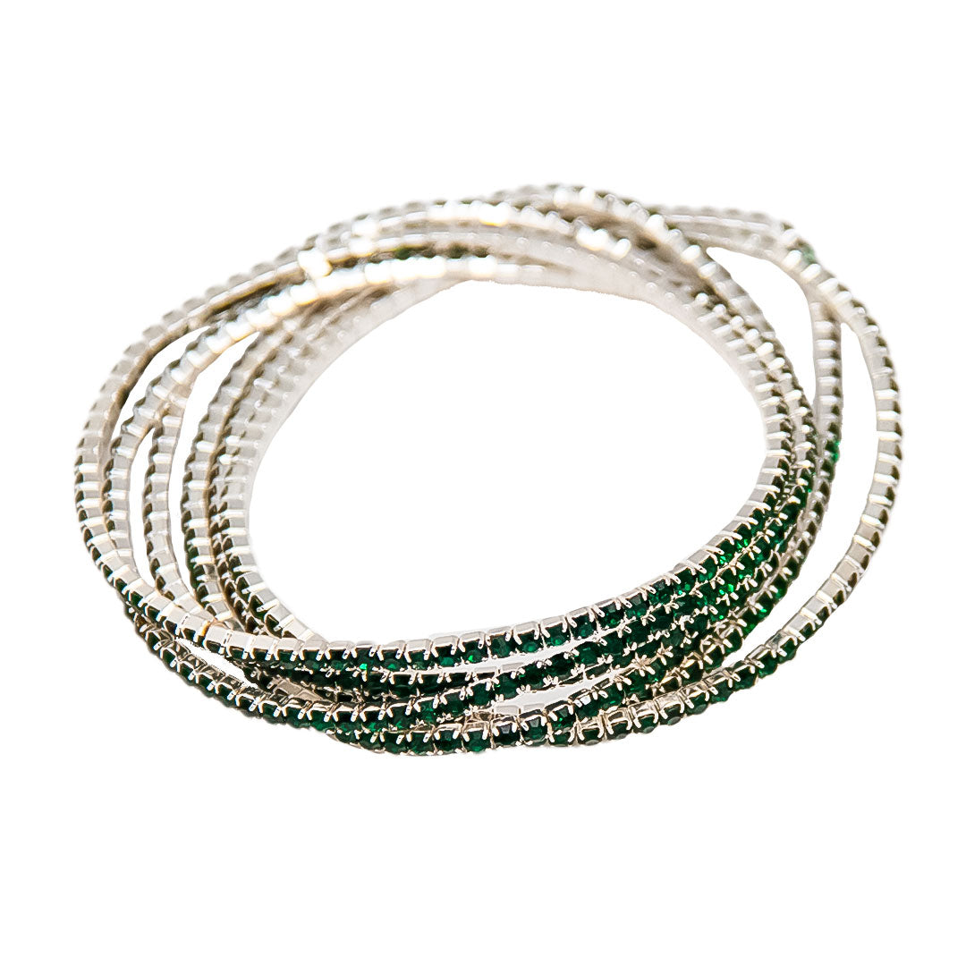 Pulseras doradas con piedras verdes